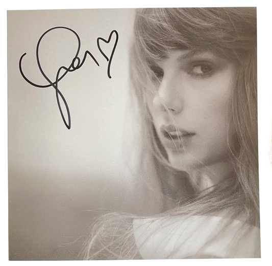 Photo signed by Taylor Swift which is included as an insert with some vinyl copies of The Tortured Poets Department.