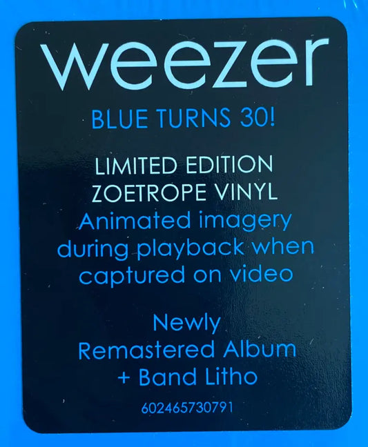 hype sticker that reads: weezer blue turns 30! limited edition zoetrope vinyl. animated imagery during playback when captured on video. newly remaster album + band litho. 602465730791.